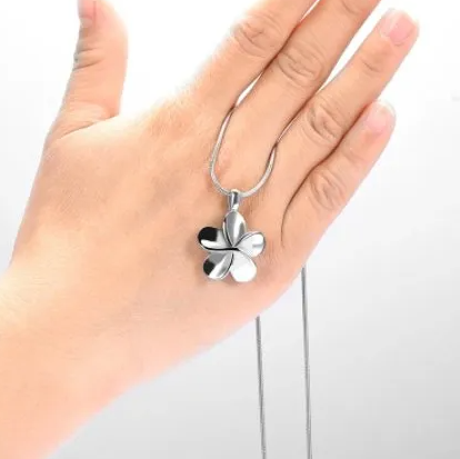 https://davisfunerals.co.nz/wp-content/uploads/2025/06/4-lovely-flower-pendant-extra-image.png